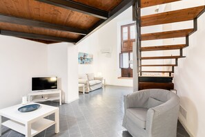 Apartment, 1 Bedroom | Living area | Flat-screen TV