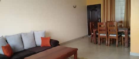 Apartment, 3 Bedrooms | Living room | 32-inch flat-screen TV with digital channels, TV