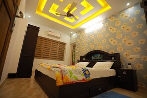 2 عدّة غرف نوم وخزنة داخل الغرفة ومكواة/لوح كي وواي فاي