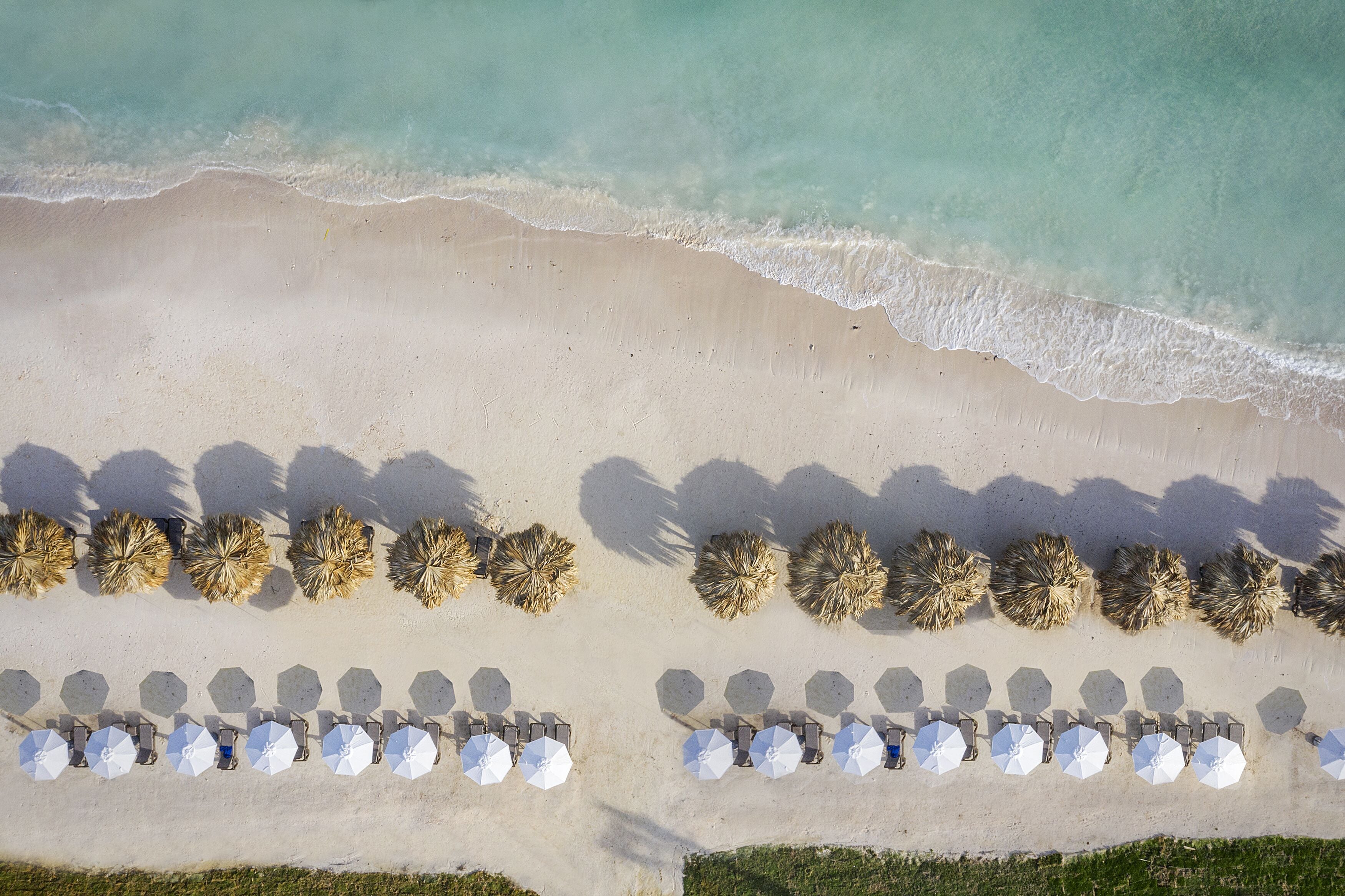 Private beach, white sand, sun loungers, beach umbrellas