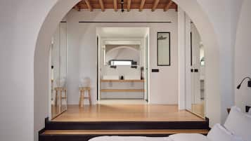 Designer toiletries, hair dryer, bathrobes, slippers