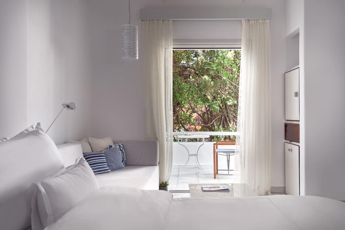 Grand Room (Sea or Pool View) | In-room safe, laptop workspace, soundproofing, iron/ironing board