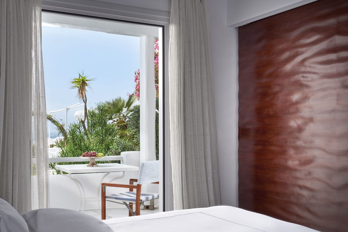 Honeymoon Suite (Sea or Pool View) | In-room safe, laptop workspace, soundproofing, iron/ironing board