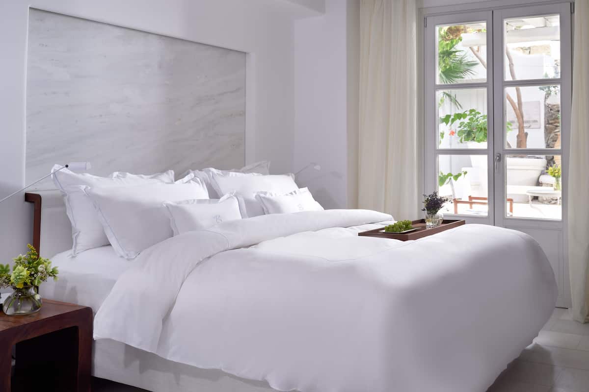 Junior Suite, Courtyard View | In-room safe, laptop workspace, soundproofing, iron/ironing board