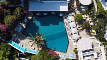 Outdoor pool, free pool cabanas, pool umbrellas