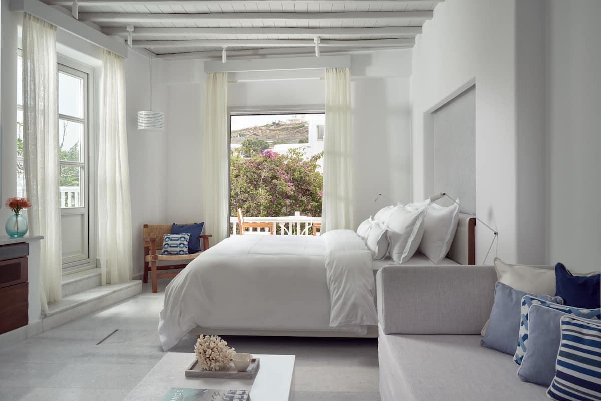 Grand Room (Sea or Pool View) | In-room safe, laptop workspace, soundproofing, iron/ironing board