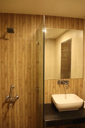 Shower, free toiletries, slippers, towels