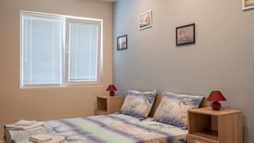 2 chambres, fer et planche à repasser, Wi-Fi, draps fournis