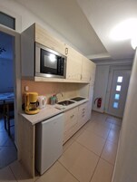 Apartamento conforto, 2 quartos (Ground Floor) | Cozinha privada