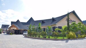 A building with a sign reading "Kikalloh Grand." - Kiikaloh Grand Resort (Machakos)