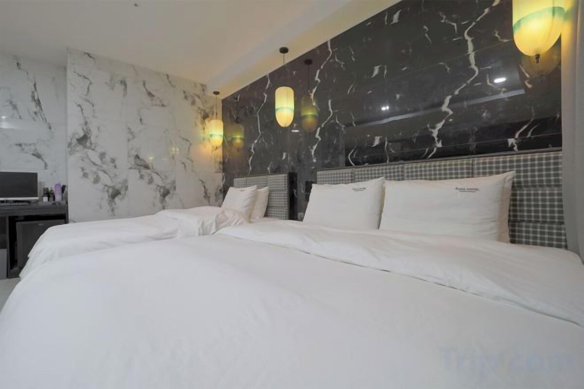 Premium bedding, down duvets, in-room safe, desk