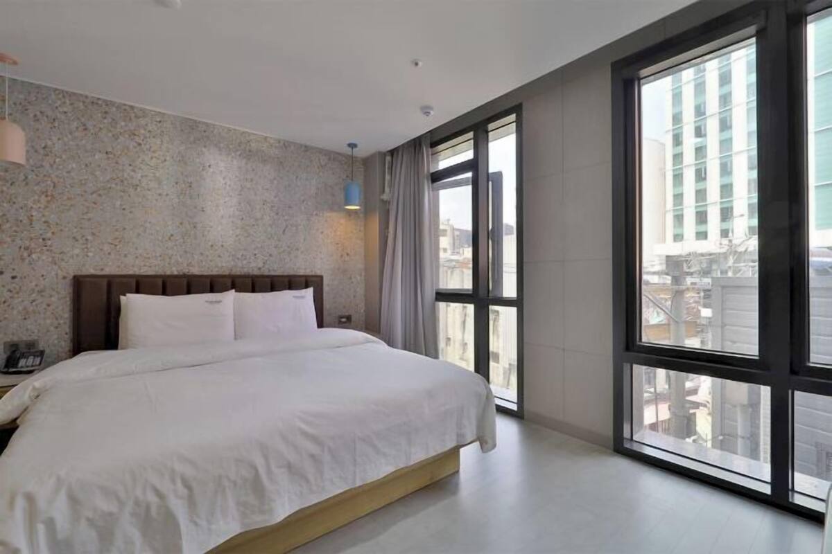 Premium bedding, down duvets, in-room safe, desk