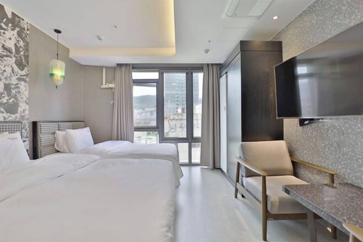 Premium bedding, down duvets, in-room safe, desk