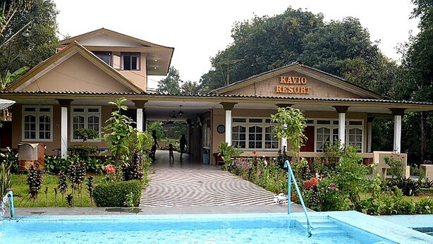 A building labeled "KAVIO RESORT" with a pool area in front. - Residences by RedDoorz near Taman Safari (Cisarua)