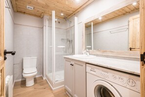 Bathtub, hair dryer, towels