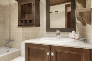 Bathtub, hair dryer, towels