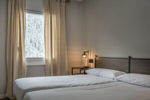 Fer et planche à repasser, Wi-Fi gratuit, draps fournis