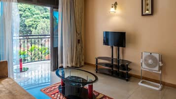 Apartment, 2 Bedrooms | Living area | 32-inch flat-screen TV with digital channels, TV