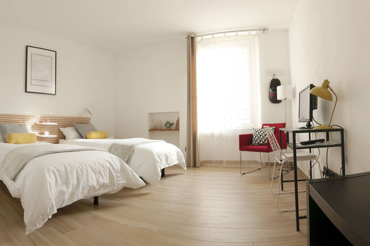 Twin Room, Shared Bathroom | In-room safe, individually decorated, individually furnished, desk
