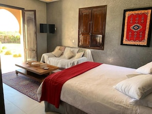 Superior Suite, Pool View | In-room safe, desk, soundproofing, free cribs/infant beds
