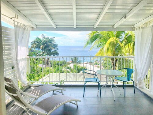 Grande Anse -mökki näkymä Karibianmerelle. Residenssi O Coeur de Deshaies