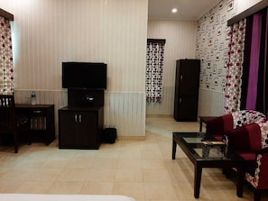 Chambre Double Luxe | Coin séjour