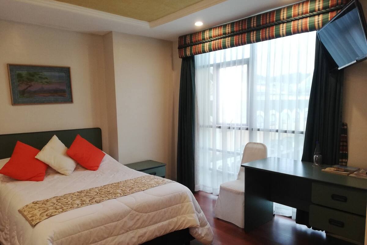 Desk, iron/ironing board, WiFi (free), bed sheets