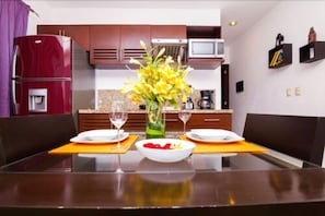 Premium Apartment, Balcony | Private kitchen | Full-sized fridge, microwave, stovetop, coffee/tea maker - Condominio La Dolce Vita (Playa del Carmen)