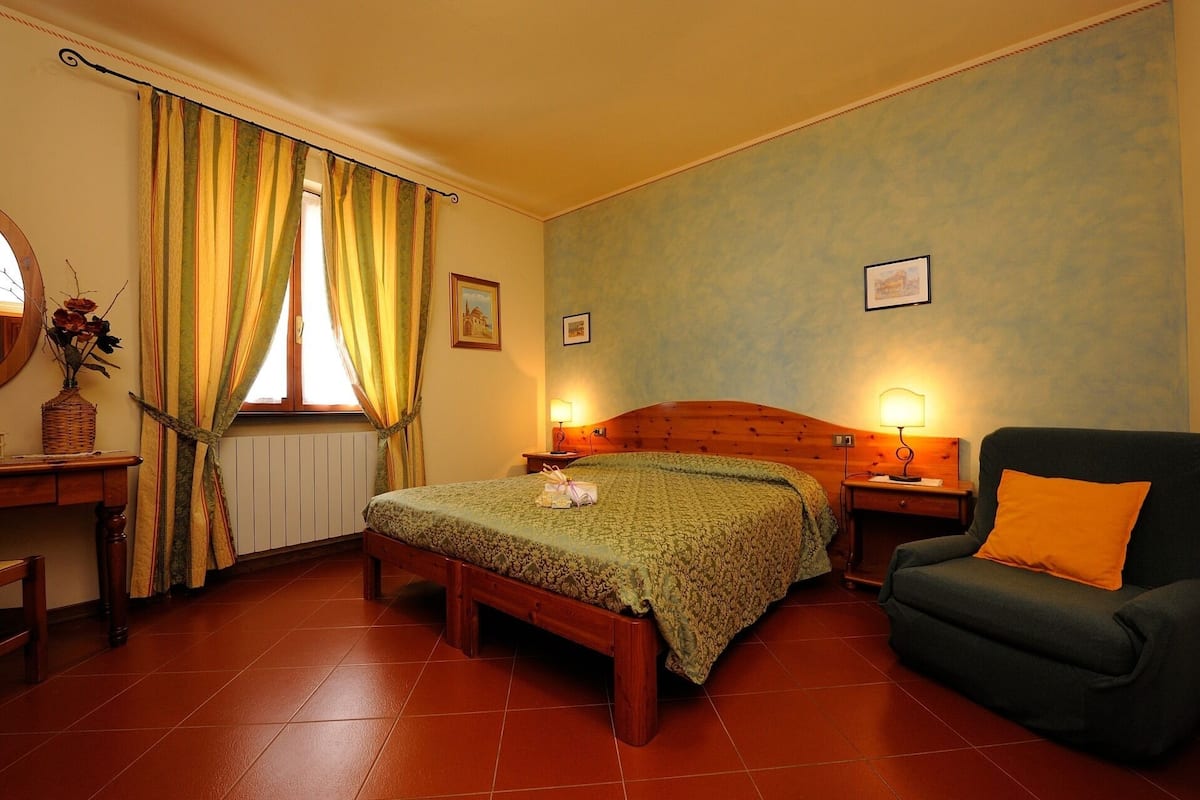 Apartment, 1 Bedroom | 1 bedroom, desk, blackout drapes, iron/ironing board