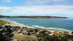 A coastal residential area with houses near the beach and ocean. - KH: Life is a Beach (Dillon Beach)
