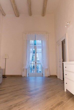 Deluxe Apartment, 1 Bedroom | Living area | 28-inch flat-screen TV with digital channels, TV - Maison la Mitra (Naples)