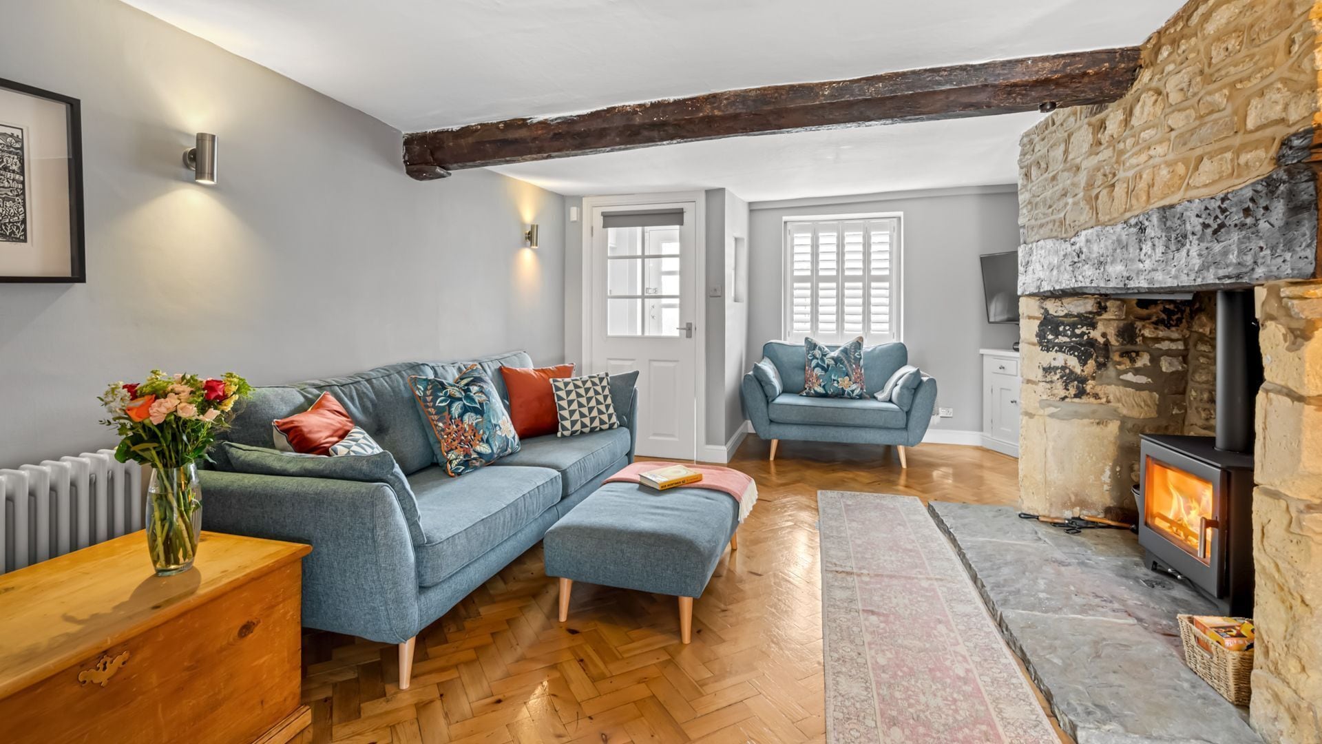 The living room is light and airy with stylish details