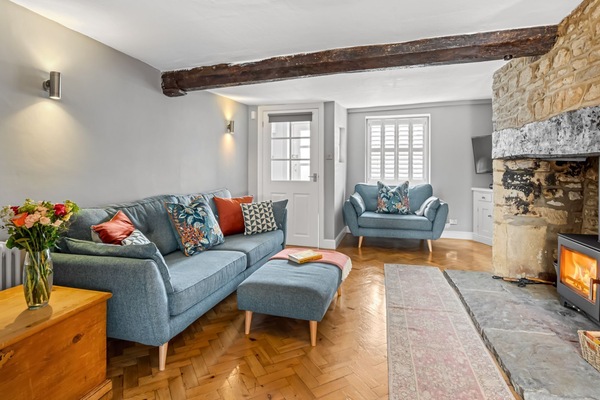 The living room is light and airy with stylish details