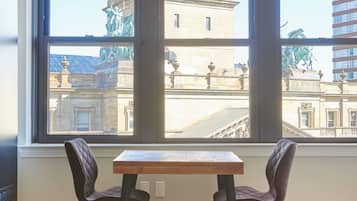 Deluxe Suite, 1 Queen Bed with Sofa bed, City View | In-room dining