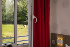 Quarto casal | Vista para o pátio