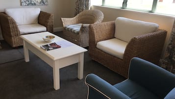 Deluxe cottage | Woonkamer