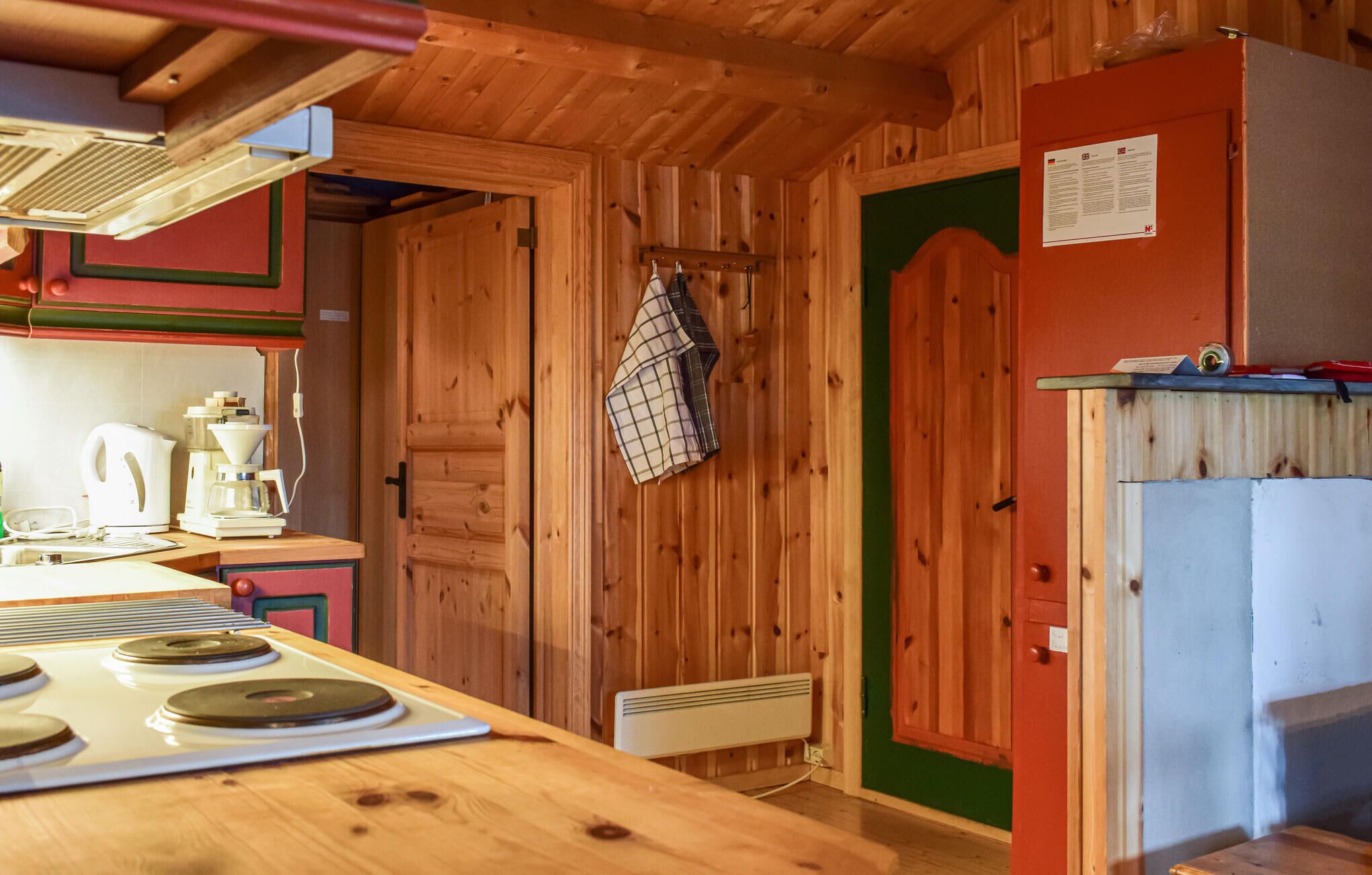 Fridge, stovetop, dishwasher, coffee/tea maker