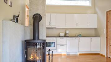 Fridge, stovetop, dishwasher, coffee/tea maker