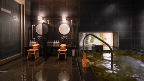 A modern bathroom with two sinks, a large mirror, and a heated floor. - Super Hotel Echizen Takefu (Echizen)