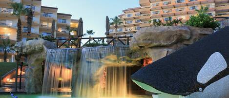 Outdoor pool, a heated pool, sun loungers