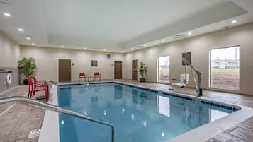 Indoor pool, open 8:00 AM to 11:00 PM, pool loungers