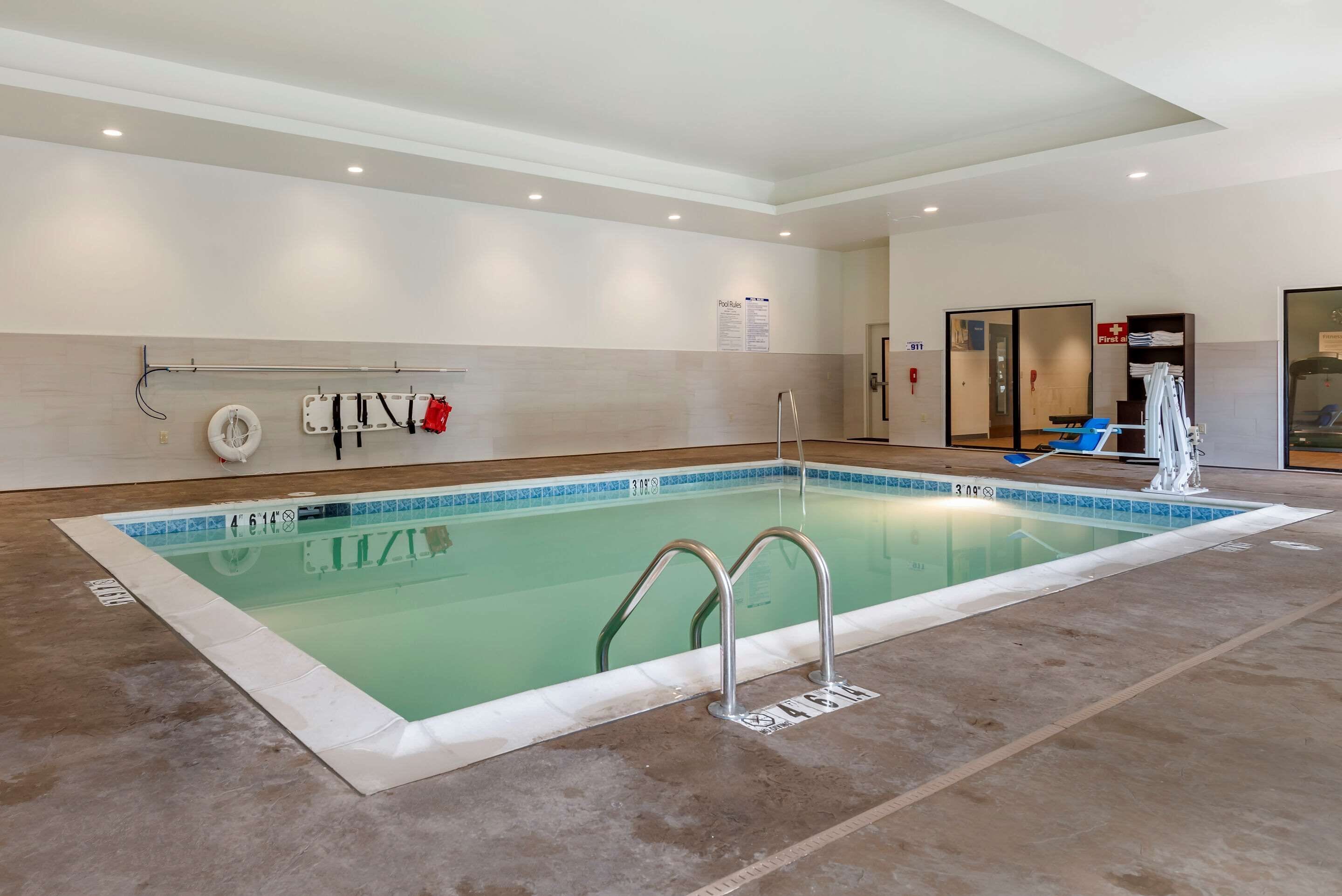 indoor pool, open 8:00 am to 11:00 pm, pool loungers