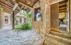 Experience the charm of a traditional heritage property with exposed brickwork and wooden beams.