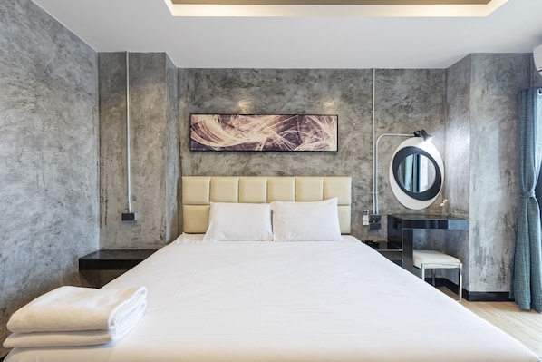 Deluxe Double Room | In-room safe, individually decorated, desk, blackout drapes