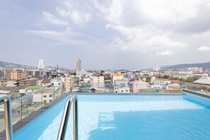 Outdoor pool, open 9:00 AM to 9:00 PM, sun loungers
