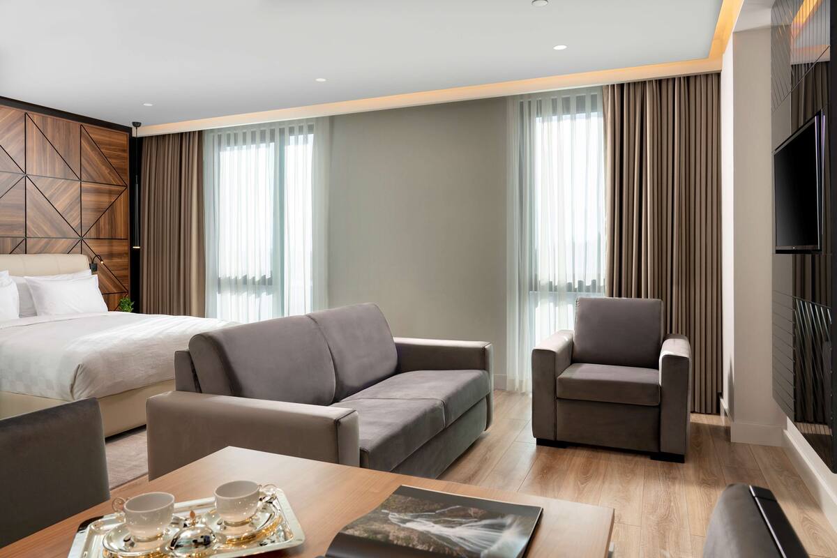 rainfall showerhead, hair dryer, slippers, bidet