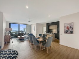 Penthouse, 3 Bedrooms | Living area | 40-inch Smart TV with digital channels, TV