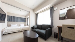 A hotel room with a bed, a sofa, a small table, a chair, a trash bin, and a large window with curtains. - Hotel Classe Stay Sapporo (Sapporo)