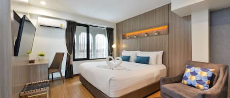 Superior King Room | Copriletto in piuma, materassi Select Comfort, una scrivania
