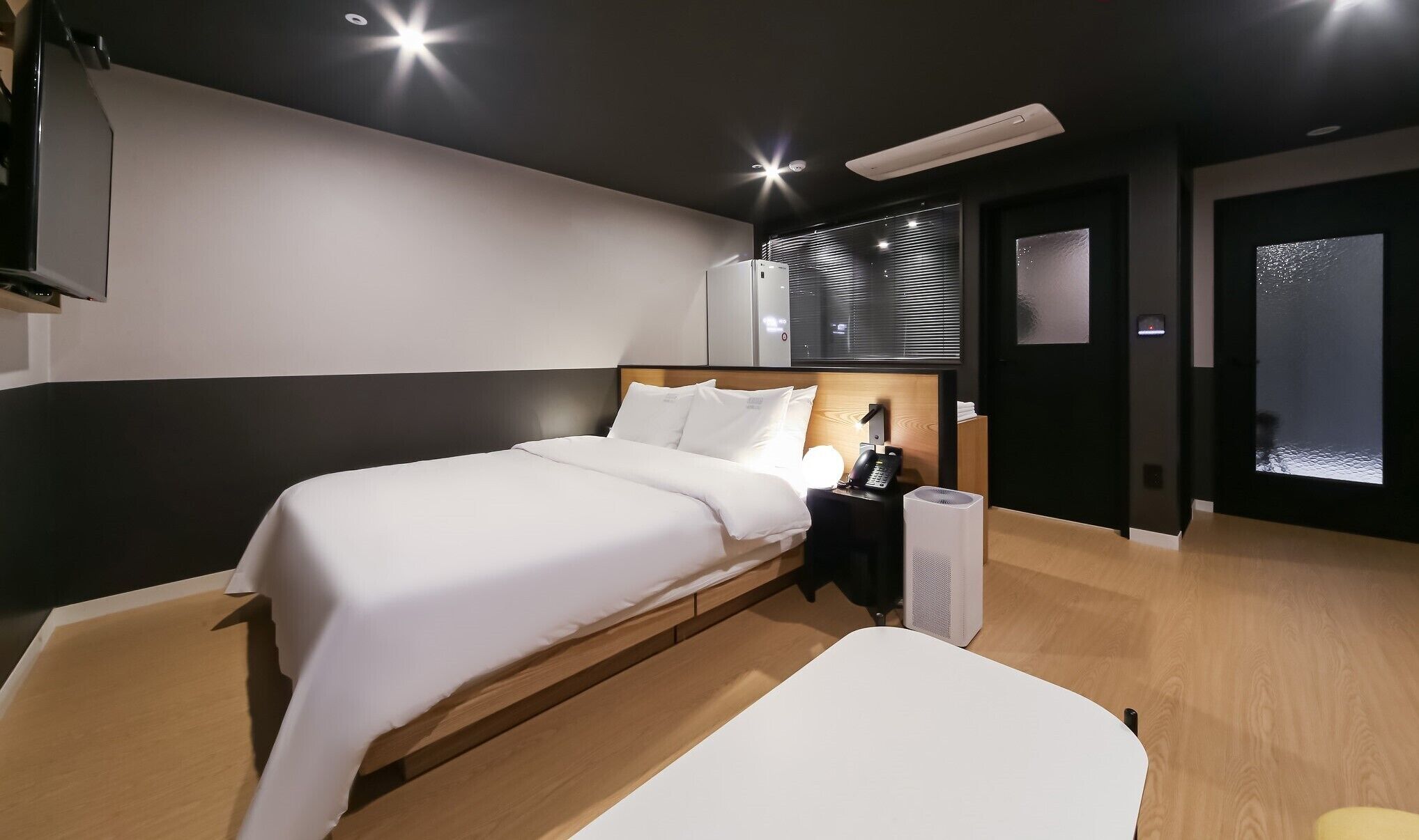premium room | premium bedding, desk, laptop workspace, blackout curtains
